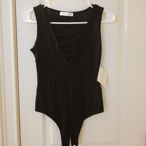 Stella Luce bodysuit, black. NWT